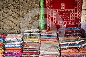 Plenty of famous traditional Berber carpets on sale, in Morocco