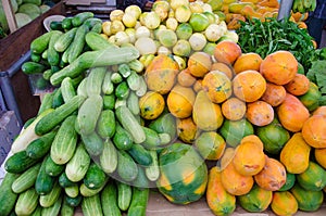 Plenty of fruits and vegetables, cucumbers, coconuts, passion fruits, salad