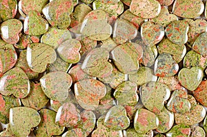 Flat lay unakite stone hearts background photo