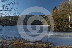 Plesne lake with ice and snow in winter beautiful sunny fresh day