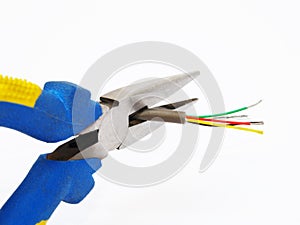 Pliers cutting a cable