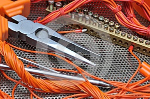 Pliers with electrical component kit