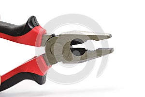Pliers tip with rubber handle on white background
