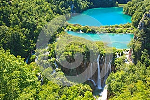 Plitvice Lakes National Park, a beautiful waterfall with turquoise water, a lake and a forest in Croatia
