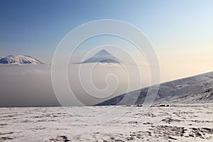 Ploskaya Dal'niaya sopka and Kluchevskoy volcano.