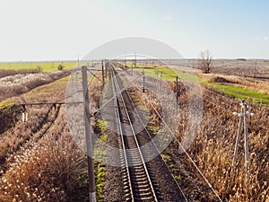 Plot railway. Top view on the rails. High-voltage lines for electric trains photo