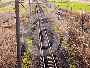Plot railway. Top view on the rails. High-voltage lines for electric trains photo