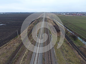 Plot railway. Top view on the rails. High-voltage power lines for electric trains