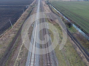 Plot railway. Top view on the rails. High-voltage power lines for electric trains