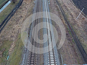 Plot railway. Top view on the rails. High-voltage power lines for electric trains