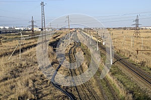 Plot railway. Top view on the rails. High-voltage power lines for electric trains photo
