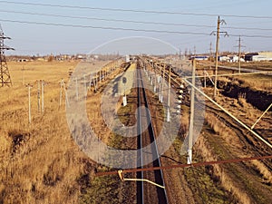 Plot railway. Top view on the rails. High-voltage lines for electric trains photo