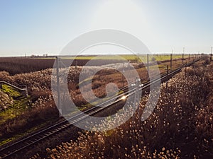 Plot railway. Top view on the rails. High-voltage lines for electric trains photo