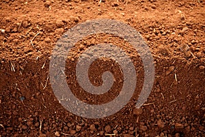 Ploughed red clay soil agriculture fields