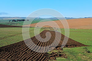 Ploughing in a hilly Overberg landscape