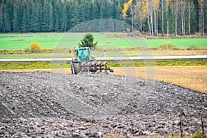 Ploughman ploughing a field in Varmland Sweden