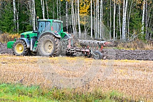 Ploughman ploughing a field in Varmland Sweden