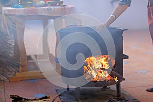 Plov preparation in the smoke