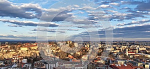 Plovdiv, Bulgaria. Panoramic view of the old and modern city and the picturesque sky with clouds. Aerial panorama