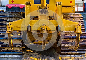 Plow behind a bulldozer, heavy groundwork machinery, ground moving equipment