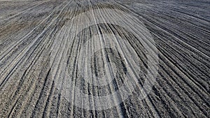 Plowed agricultural field, aerial view. Agricultural land. Background