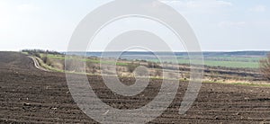 Plowed agriculture lands panorama