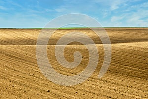 Plowed field landscape in springtime