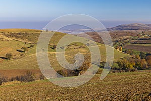 Plowed fields and meadows in the mountains