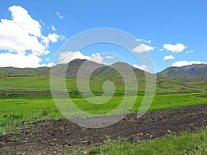 Plowed and green fields at Avoca valley of Southern Drakensberg photo