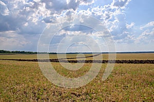 Plowed land, harvested, cultivated Chernozem photo