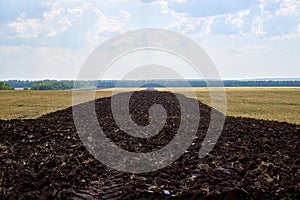 Plowed land, harvested, cultivated Chernozem photo