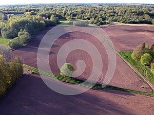 Plowed spring time agriculture fields, aerial view