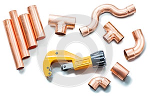 Plubing tools copper pipes and fittings with pipe cutter isolated