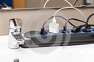 plug in an electrical socket at bathroom