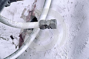 Plug on old plastic water supply pipe photo