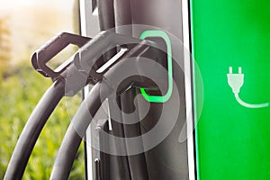 plug hang in station ready to fuel electric car with power instead of gasoline or petrol is the new way for mobility