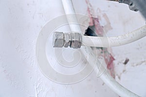 Plug on old plastic water supply pipe