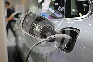 Plug socket charging Electric vehicle EV concept of new technology for automobile vehicles use electricity