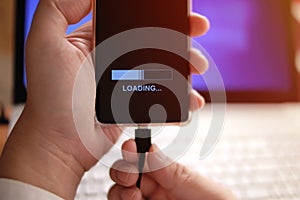 Plug in USB cord cable on smart phone, charging or and data transfer on mobile phone