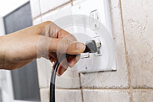 Plugging into Electrical Outlet