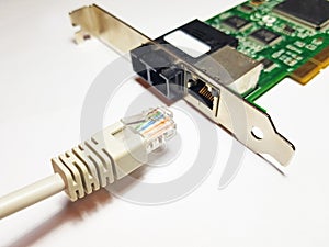 Plugging in a UTP cable into a LAN network card