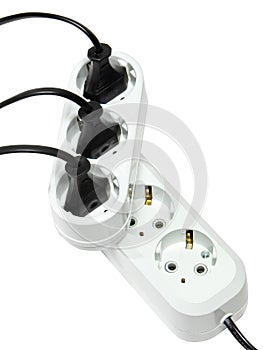 Plugs in electric socket. Isolated