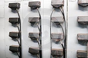 Plugs for wires for connecting iron metal cabinets for electrical equipment of electric motors at an industrial refinery chemical