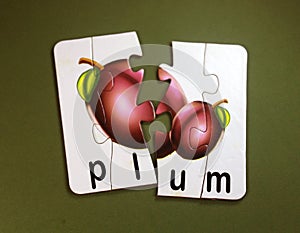 Plum fruits in puzzle