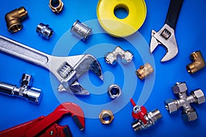 Plumber equipment on blue background