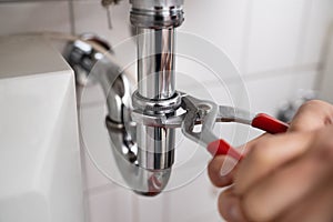 Plumber Fitting Sink Pipe