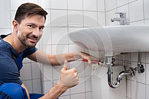 Plumber Fitting Sink Pipe