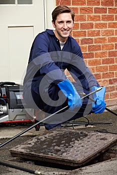 Plumber Fixing Problem With Drains