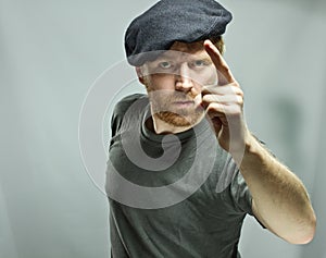 Plumber in hat with red beard