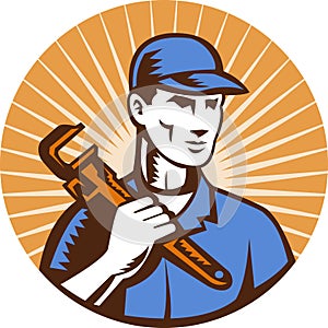 Plumber holding monkey wrench